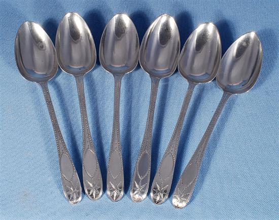 A set of six Irish silver bright cut engraved dessert spoons, Length: 7 ¼/181mm Total Weight: 7.3oz/208grms